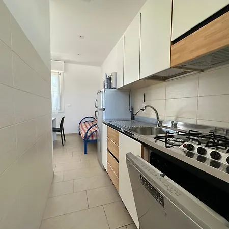 Апартаменты Great And Bright Flat With Pool Бибионе